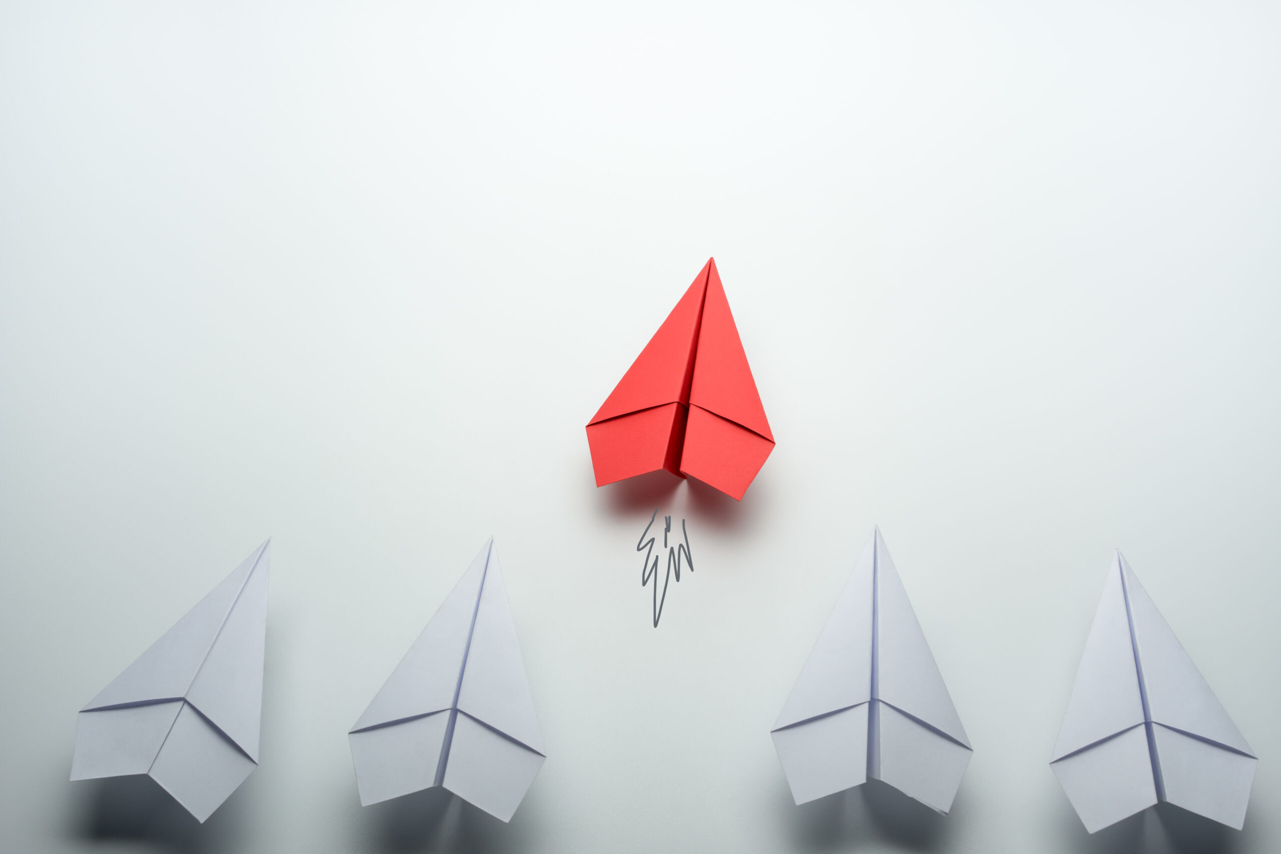 Embarking on Successful Leadership: The Symbolic Red Paper Plane Concept