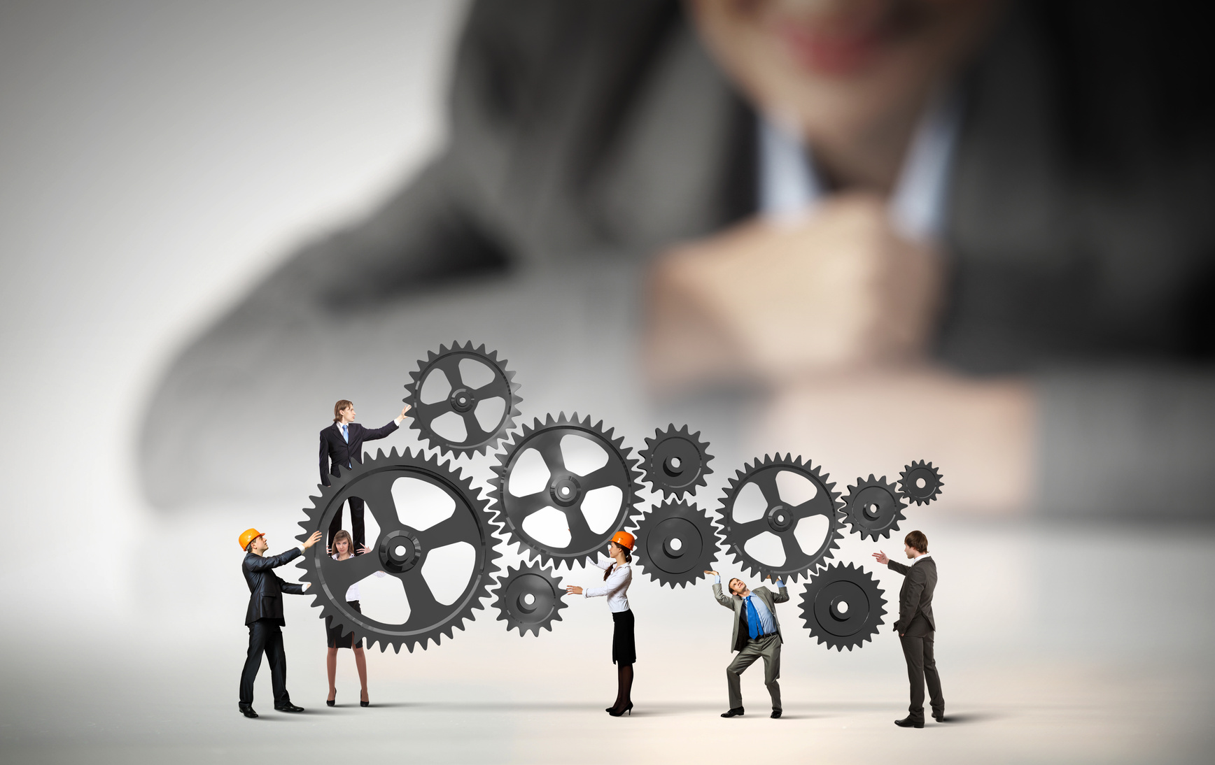 Effective Crisis Communication: Small Figures Working on Gears Under Supervision Effective Crisis Communication: Small Figures Working on Gears Under Supervision